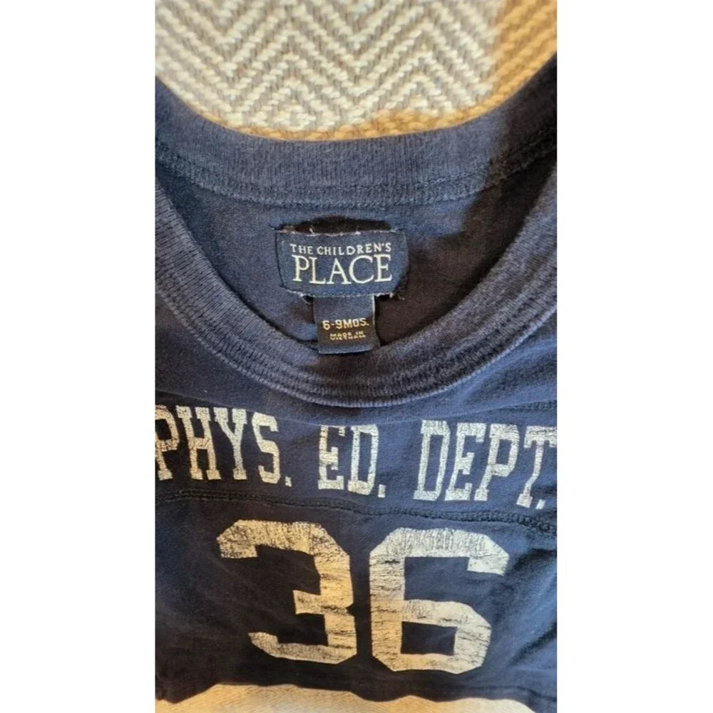 The Children’s Place baby boys’ football-style tee, size 6–9 months